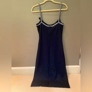 St. John elegant black dress. Signature St. John knit. Excellent condition.